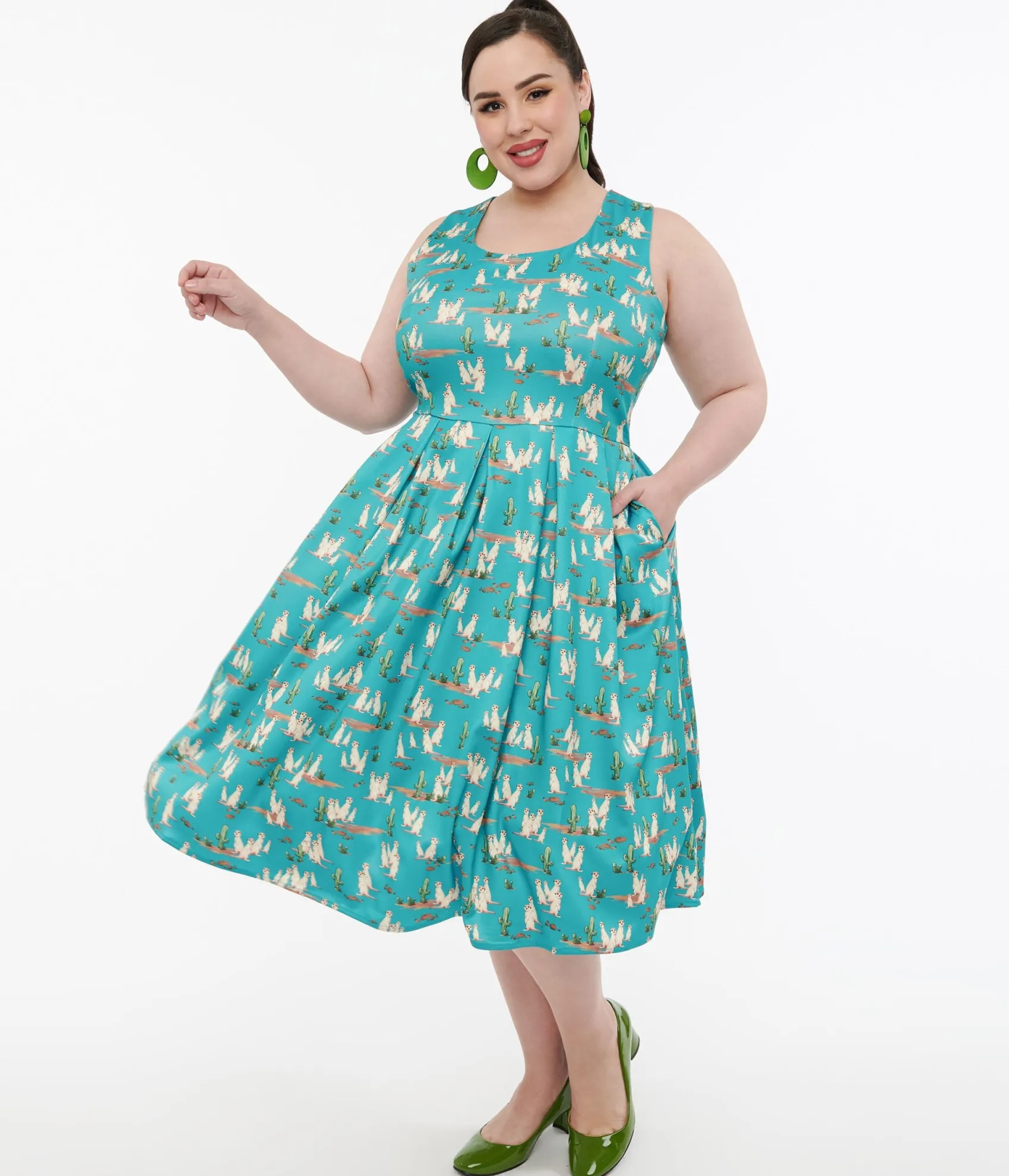 Unique Vintage Dolly & Dotty 1950s Turquoise Meerkat Print Amanda Swing Dress Clearance